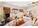 Spacious living room with light walls, wood flooring, and comfortable furnishings at 112 Christopher Ln, Stockbridge, GA 30281