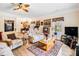 Bright living room featuring light walls, wood flooring, and comfortable furnishings at 112 Christopher Ln, Stockbridge, GA 30281