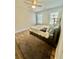 Bright bedroom with a double bed and wood floors at 3385 Continental Dr, Cumming, GA 30041