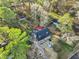 Aerial view of house and property; two-story home, deck, and large yard at 1852 Red Rose Ln, Loganville, GA 30052