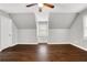 Bright bedroom featuring hardwood floors and a window seat at 1852 Red Rose Ln, Loganville, GA 30052