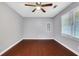 Bedroom with hardwood floors and ceiling fan at 1852 Red Rose Ln, Loganville, GA 30052