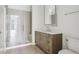 Modern bathroom with a glass shower and wood vanity at 775 Juniper Ne St # 614, Atlanta, GA 30308