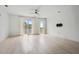 Spacious bedroom with hardwood floors and access to a balcony at 775 Juniper Ne St # 614, Atlanta, GA 30308