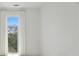 Simple bedroom with a window and white walls at 775 Juniper Ne St # 614, Atlanta, GA 30308