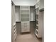 Spacious walk-in closet with shelves and drawers at 775 Juniper Ne St # 614, Atlanta, GA 30308