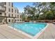 Community pool with plenty of lounge chairs at 775 Juniper Ne St # 614, Atlanta, GA 30308