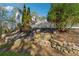Charming home with a well-manicured yard and rustic stone retaining wall at 220 Spring Branch Dr, Canton, GA 30115