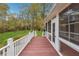 Inviting deck overlooking lush backyard, perfect for outdoor entertaining at 220 Spring Branch Dr, Canton, GA 30115