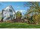 Beautifully landscaped front yard with stone accents and mature trees at 220 Spring Branch Dr, Canton, GA 30115
