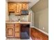 Convenient kitchenette features a sink, microwave, and compact refrigerator in a bonus room at 220 Spring Branch Dr, Canton, GA 30115