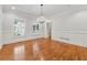 Spacious living room featuring hardwood floors, natural light, and modern fixtures at 220 Spring Branch Dr, Canton, GA 30115