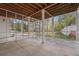 Spacious screened porch offering an outdoor living space with views of the backyard at 220 Spring Branch Dr, Canton, GA 30115