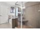 Modern bathroom with a tiled walk-in shower, a soaking tub, and elegant fixtures, creating a spa-like retreat at 3210 Ancoats St, Douglasville, GA 30135