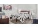 A cozy bedroom featuring elegant decor and comfortable furnishings at 3210 Ancoats St, Douglasville, GA 30135