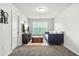 Versatile bedroom or flex room with a daybed, TV, and plenty of space for relaxation or recreation at 3210 Ancoats St, Douglasville, GA 30135