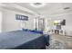 Cozy bedroom with a comfortable bed, large windows, and stylish decor, offering a relaxing and inviting space at 3210 Ancoats St, Douglasville, GA 30135
