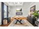 Entertainment space featuring a custom air hockey table, fireplace, and modern decor at 3210 Ancoats St, Douglasville, GA 30135