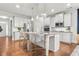 Modern kitchen with stainless steel appliances, a kitchen island, and stylish pendant lighting at 3210 Ancoats St, Douglasville, GA 30135