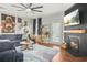 Comfortable living room with stylish decor, fireplace, and a cozy seating area perfect for relaxing or entertaining at 3210 Ancoats St, Douglasville, GA 30135