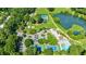 Aerial view of community features including tennis courts, pool, and clubhouse at 10 Chaumont Nw Sq, Atlanta, GA 30327