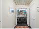Convenient laundry room includes modern washer and dryer, closet with storage shelves, and neutral paint at 572 Edgewood Ne Ave # 306, Atlanta, GA 30312