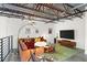 Comfortable living room with stylish furnishings, a large TV, and an open floor plan at 572 Edgewood Ne Ave # 306, Atlanta, GA 30312