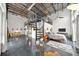 Contemporary living space with polished floors, spiral staircase, bedroom, and an open layout at 572 Edgewood Ne Ave # 306, Atlanta, GA 30312