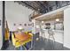 Open-concept living area featuring a dining space, modern kitchen, and unique architectural details at 572 Edgewood Ne Ave # 306, Atlanta, GA 30312
