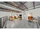 Open living area with exposed ductwork, modern decor, and an abundance of natural light at 572 Edgewood Ne Ave # 306, Atlanta, GA 30312
