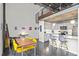 Inviting living space with a dining table, sleek kitchen, and artwork on the walls at 572 Edgewood Ne Ave # 306, Atlanta, GA 30312