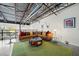 Stylish living room with an L-shaped sofa, area rug, and modern decor at 572 Edgewood Ne Ave # 306, Atlanta, GA 30312