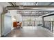 Upper loft area featuring an office space with a desk, chair, and great natural light at 572 Edgewood Ne Ave # 306, Atlanta, GA 30312
