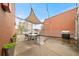 Spacious rooftop patio with shade covering, barbecue grill, dining table, and city views at 572 Edgewood Ne Ave # 306, Atlanta, GA 30312