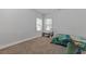 Well-lit bedroom with neutral walls and carpet, offering a cozy and inviting space at 3213 Blackley Old, Douglasville, GA 30135