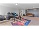 Bright and airy bonus room featuring comfortable seating and a movie-themed rug at 3213 Blackley Old, Douglasville, GA 30135