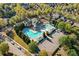 Overhead shot of a community pool showcasing its multiple pools, a pool house, and lounging areas at 3213 Blackley Old, Douglasville, GA 30135