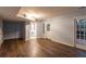 Finished basement with wood-look flooring and access to outdoors at 100 Lakeside Dr, Covington, GA 30016