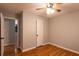 Spacious bedroom with hardwood floors and ample closet space at 100 Lakeside Dr, Covington, GA 30016