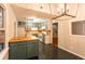 Renovated kitchen with new cabinets, countertops, and flooring at 100 Lakeside Dr, Covington, GA 30016