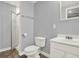 Basement bathroom with shower, toilet, and vanity at 6255 James Rd, Austell, GA 30168