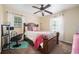 Bedroom with natural light, desk area, and a comfortable queen-size bed at 1236 Country Pine Dr, Ellenwood, GA 30294