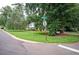 Ranch style home with mature landscaping and street view at 1236 Country Pine Dr, Ellenwood, GA 30294