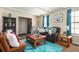 Well-lit living room with comfortable seating, bright curtains, and stylish decor accents at 1236 Country Pine Dr, Ellenwood, GA 30294