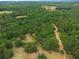 Aerial view of a wooded property showing land ready for new construction at 160 Cross Rd, Covington, GA 30016