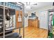 Well-lit bedroom with wood floors, built-in bunk bed, and dresser at 160 Cross Rd, Covington, GA 30016