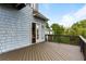 Outdoor deck that leads to an open door that is part of the gray exterior of the house at 2941 Lookout Ne Pl, Atlanta, GA 30305