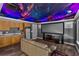 Entertainment room with custom ceiling, kitchenette, and stylish furnishings at 2941 Lookout Ne Pl, Atlanta, GA 30305