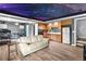 Living room with custom ceiling, kitchenette, and workout area at 2941 Lookout Ne Pl, Atlanta, GA 30305