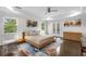 Bright and airy bedroom features tray ceilings and private balcony at 2941 Lookout Ne Pl, Atlanta, GA 30305